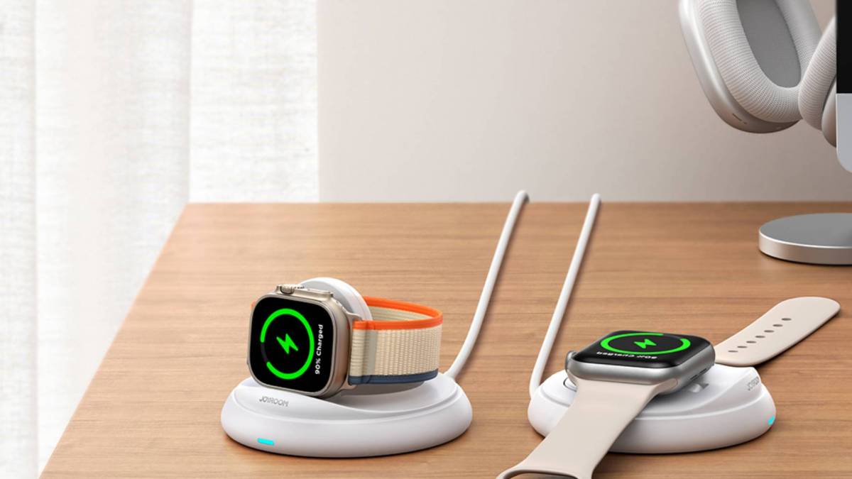 A smart watch charging on a wireless charger